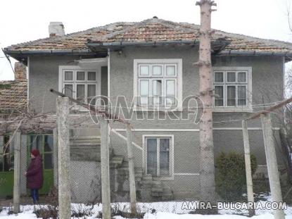 Bulgarian house in a big village front