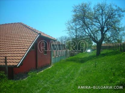 Bulgarian house near a lake and a river back