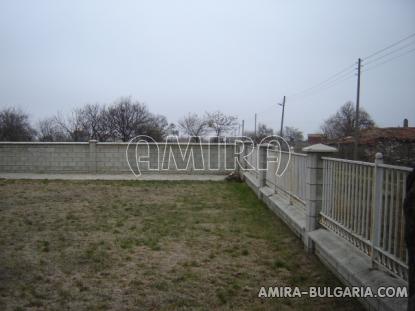 New house near a golf course fence 2