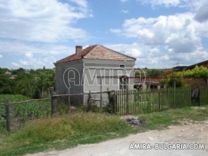 House with garage near a dam side