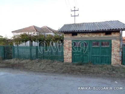 House with garage near a dam 1